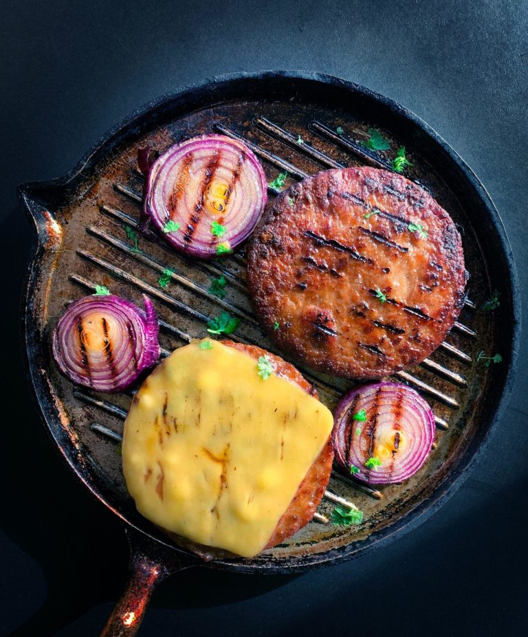 Why Your Burgers Puff Up on the Grill and How to Keep Them Juicy